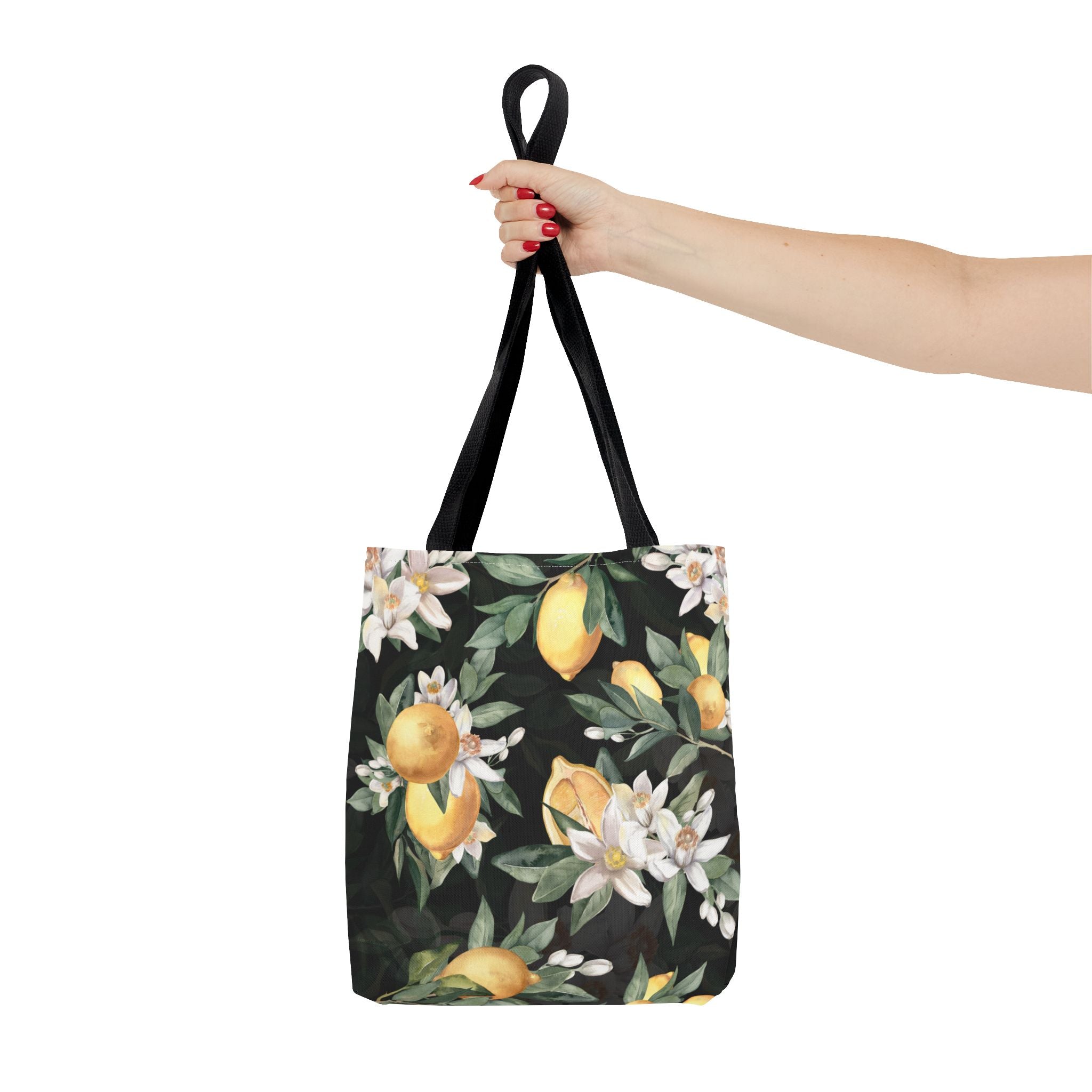 Tote bag with lemon and flower pattern on a white background
