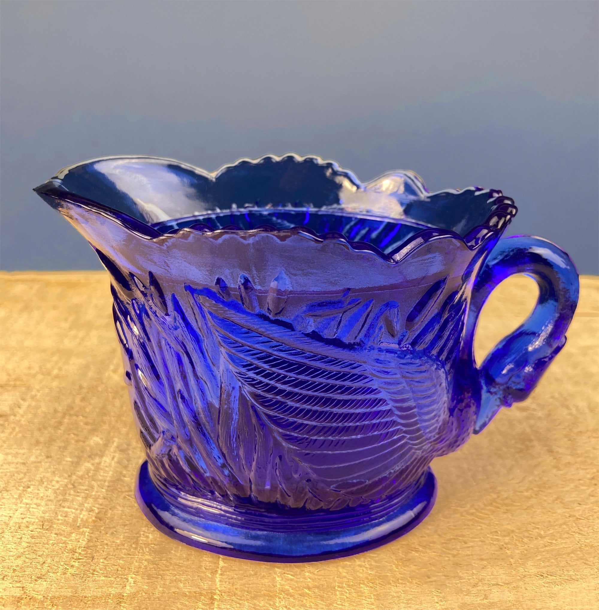Cobalt Blue Creamer with Swan-Shaped Handle and Lid. Glass Creamer with Embossed Reed and Swans. Collectible Glass.